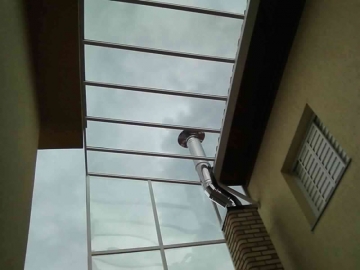 Cobertura em Policarbonato Compacta Quintal do Sobrado