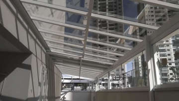 Cobertura e Fechamento de Sacada em Vidro Laminado